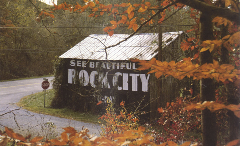 Barn in fall with 'See Beautiful Rock City' sign