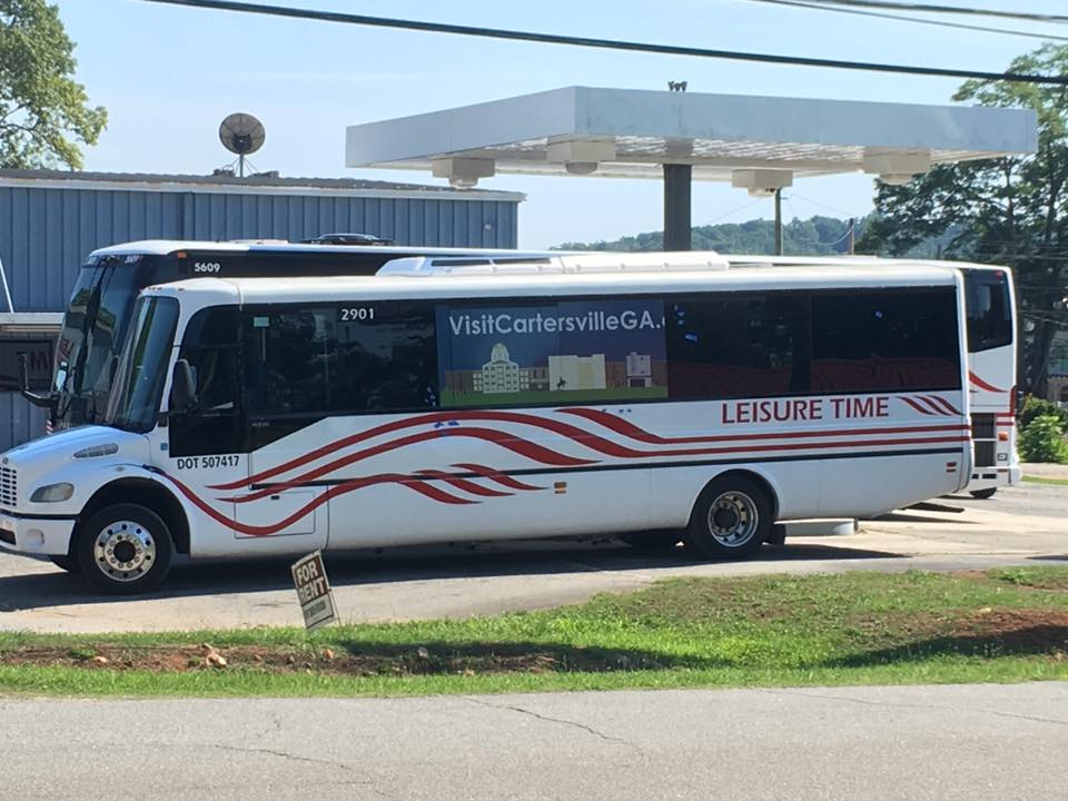 2901 Bus with Visit Cartersville GA sign parked at Leisure Time offices.